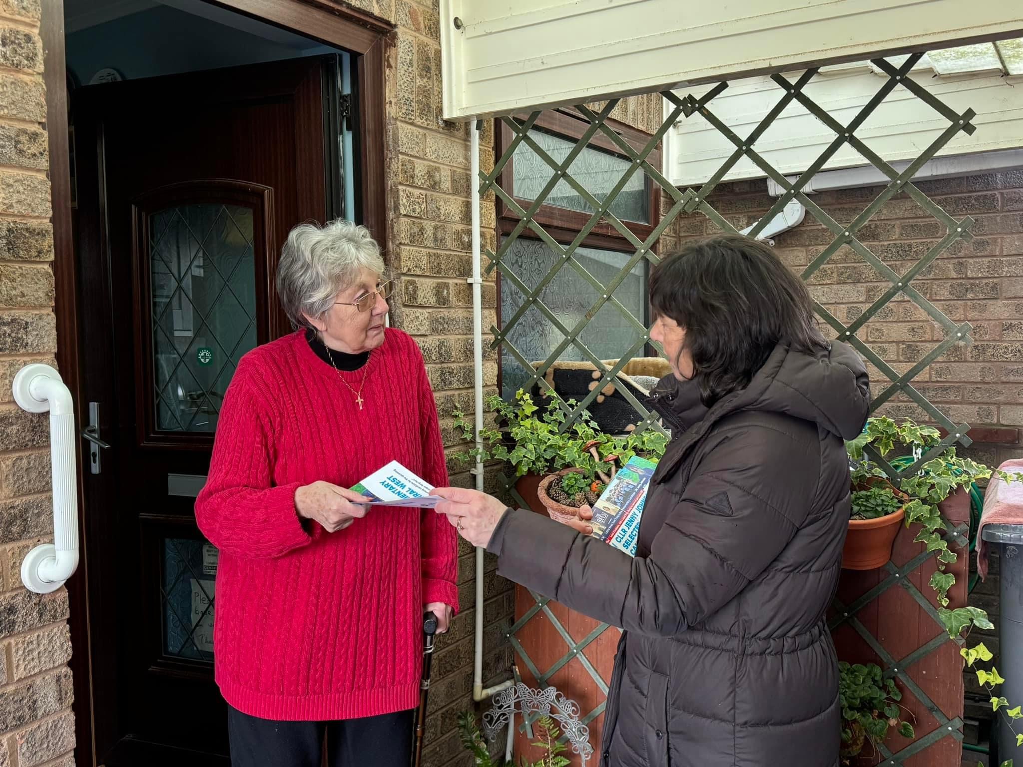Jenny speaking with residents about her plan for Wirral West
