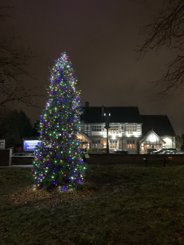 The lit tree at Spital Cross Roads