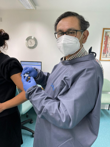 Dr Ivan Camphor vaccinating